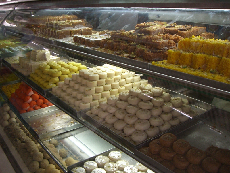 Street sweets mithai shop in Goa, India