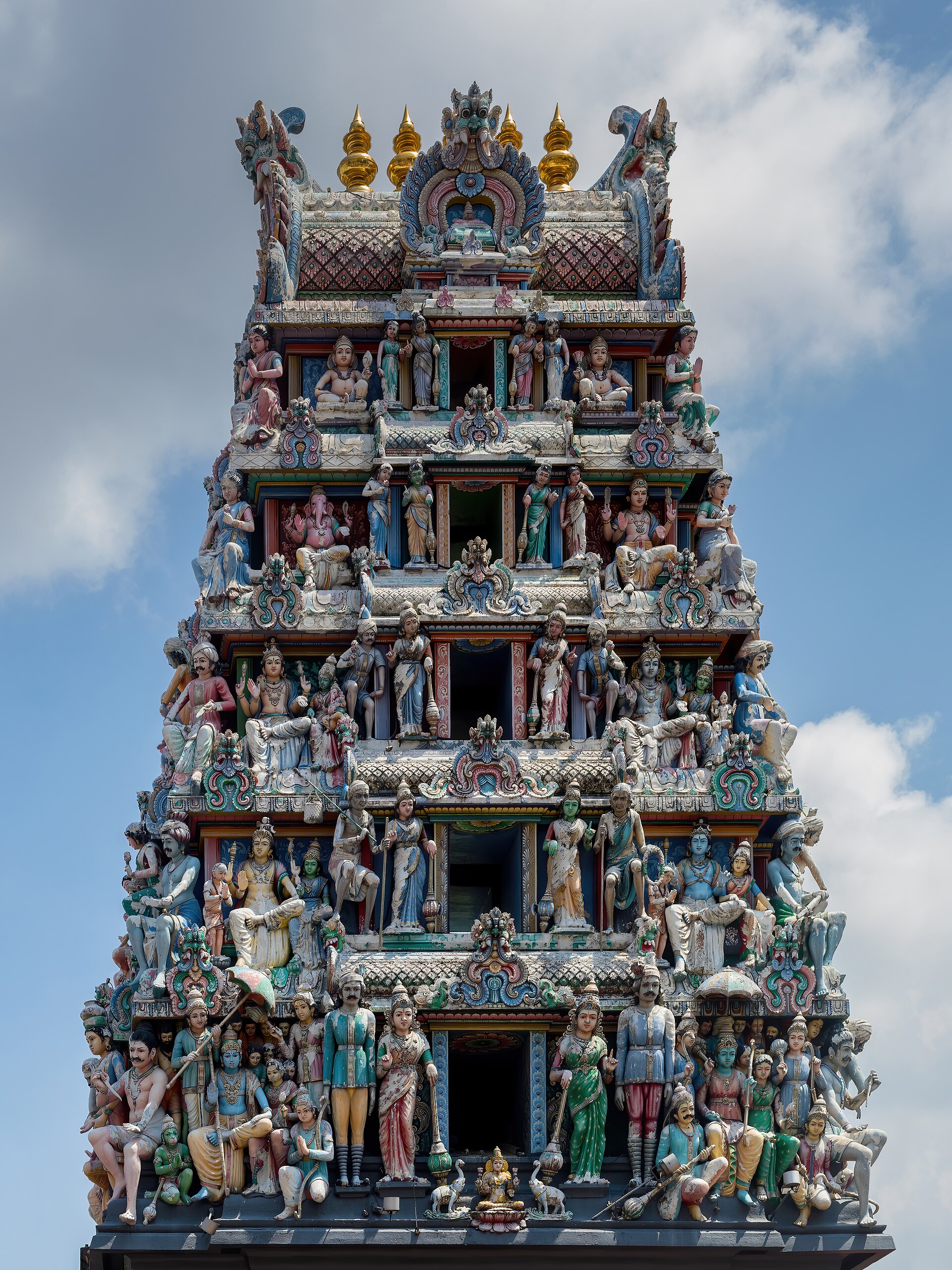 Gopuram monumental ornate tower at the entrance of Sri Mariamman Temple with sculptures of Hindu deities China