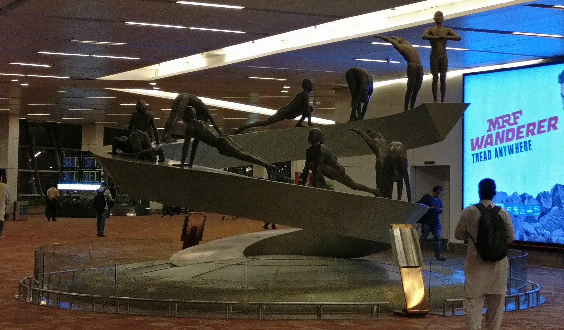 Sculpture in Terminal 3 of Indira Gandhi International Airport at Delhi depicting the Surya Namaskara asanas