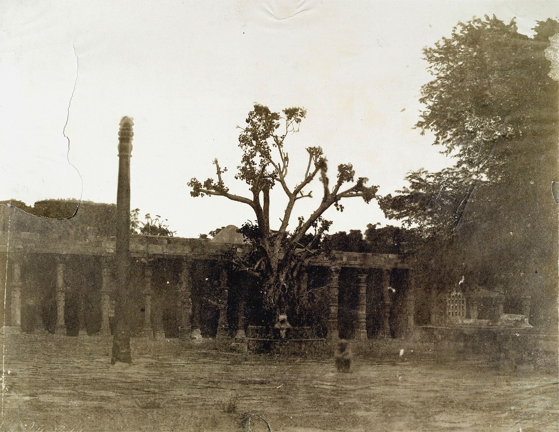 Iron pillar at the Qutb Minar complex, Delhi in 1858