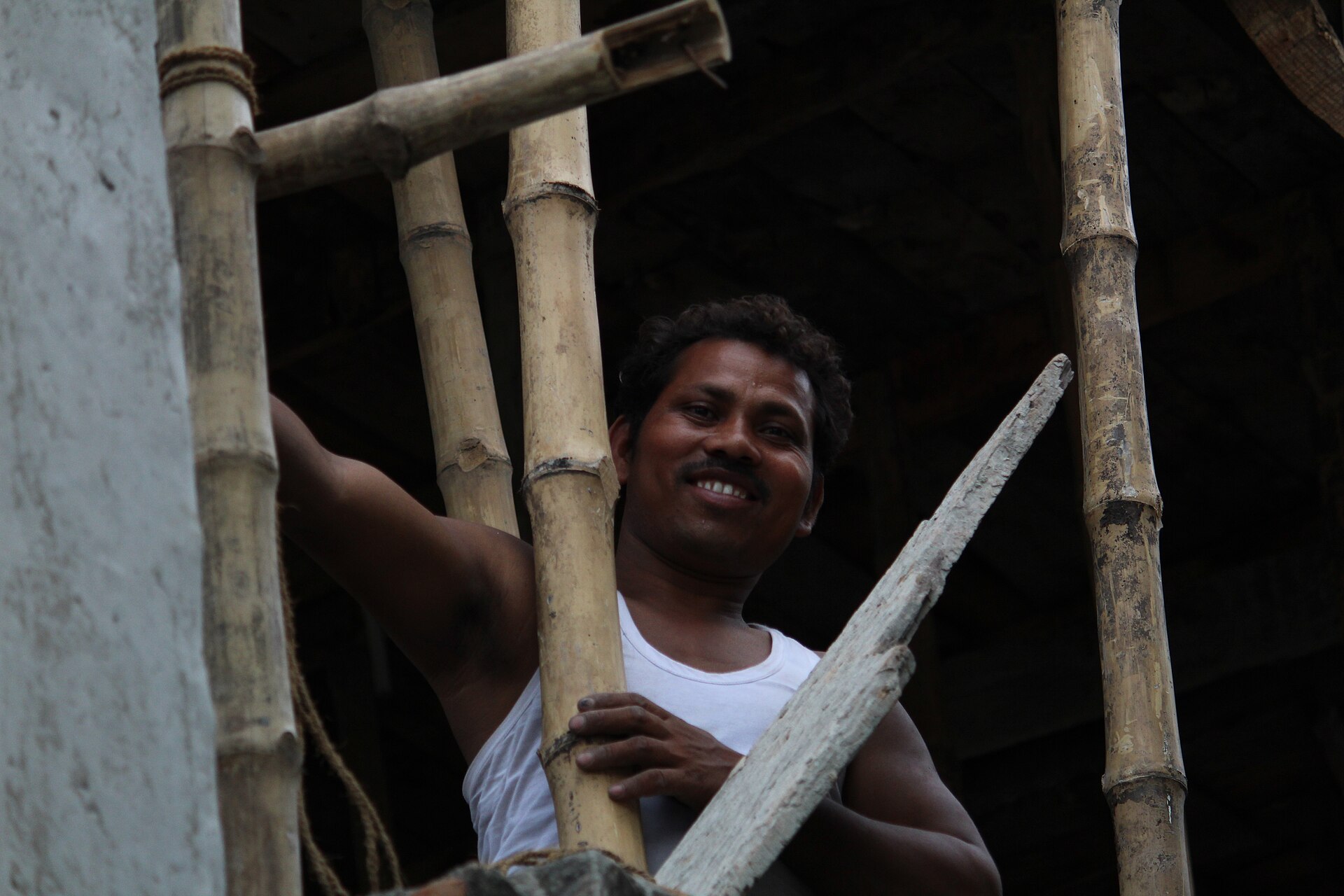 Male labour working at Building construction site